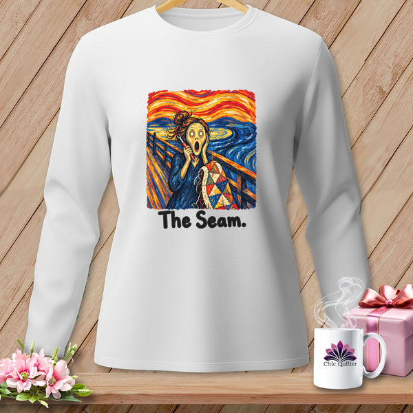 White sweatshirt with a graphic of Munch's "The Scream" and text "The Seam."