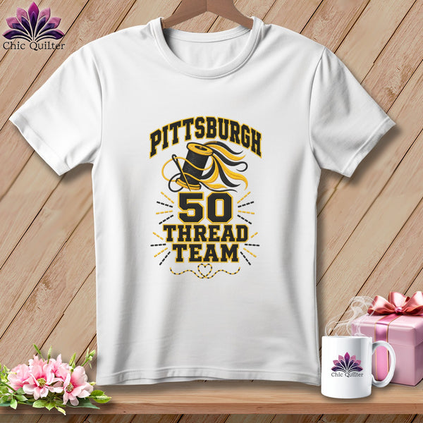 White t-shirt with black and yellow graphic text reading Pittsburgh 50 Thread Team.