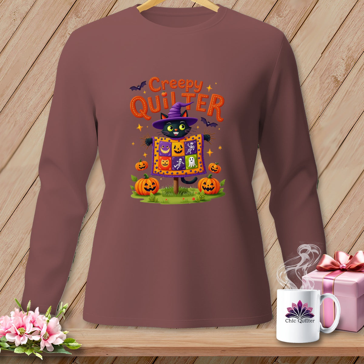 Halloween long-sleeve shirt with a black cat scarecrow and "Creepy Quilter" text.