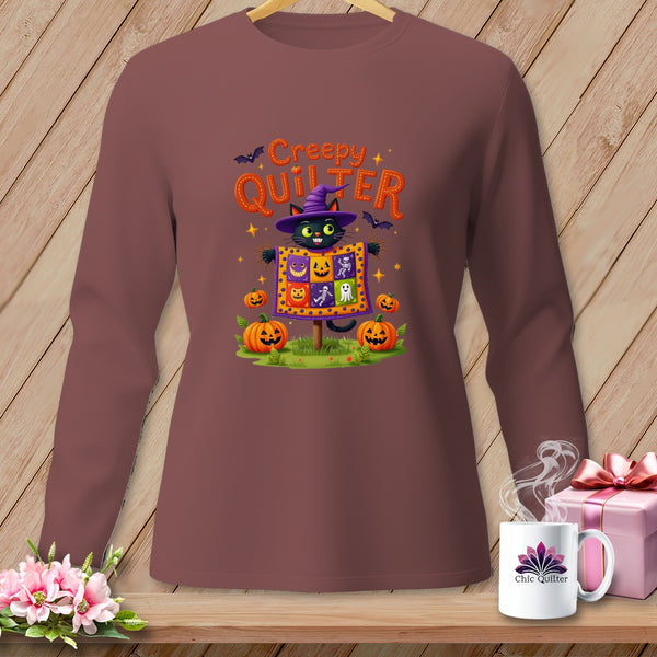Halloween long-sleeve shirt with a black cat scarecrow and "Creepy Quilter" text.