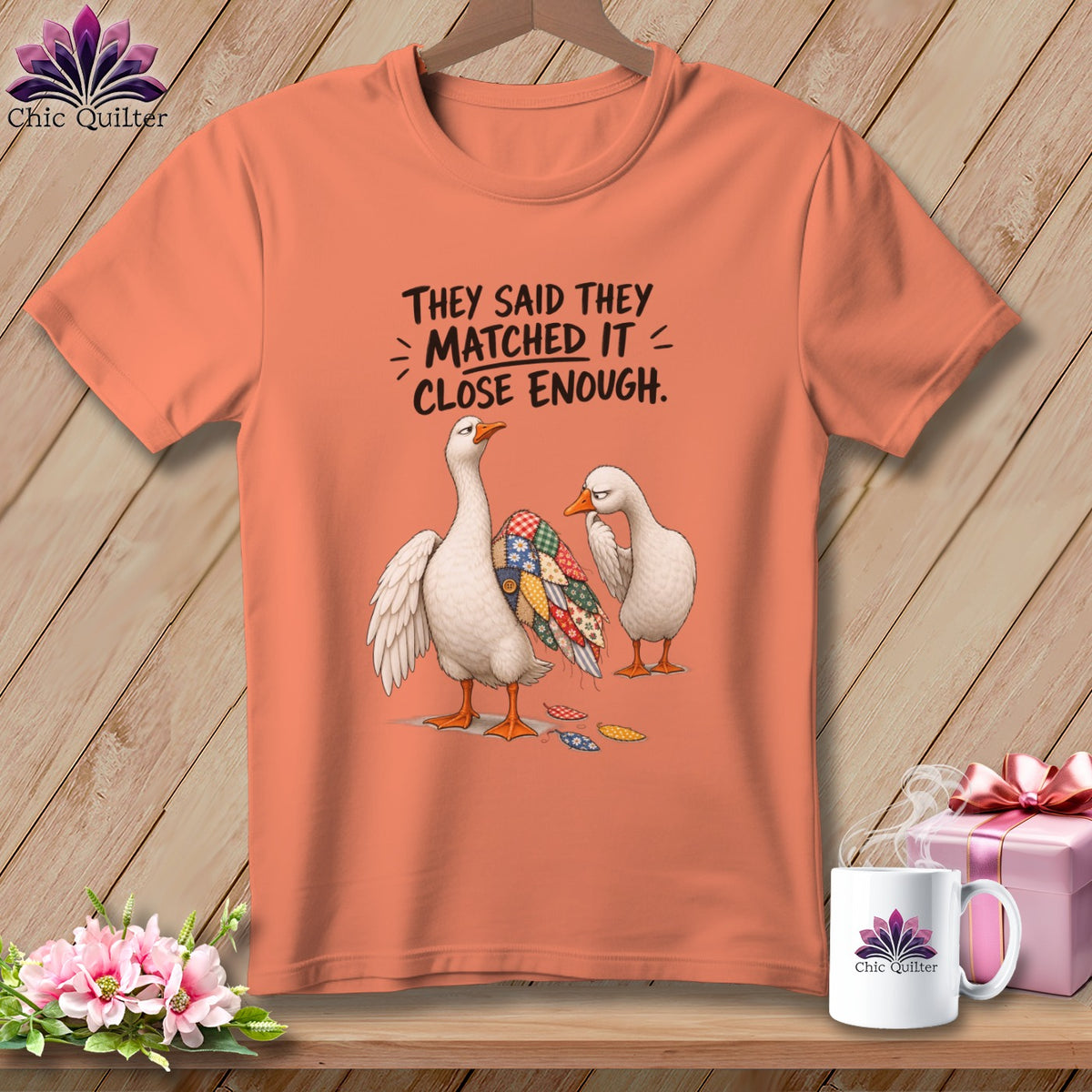Two geese with a patchwork quilt design on one, text reads "They said they matched it... close enough."