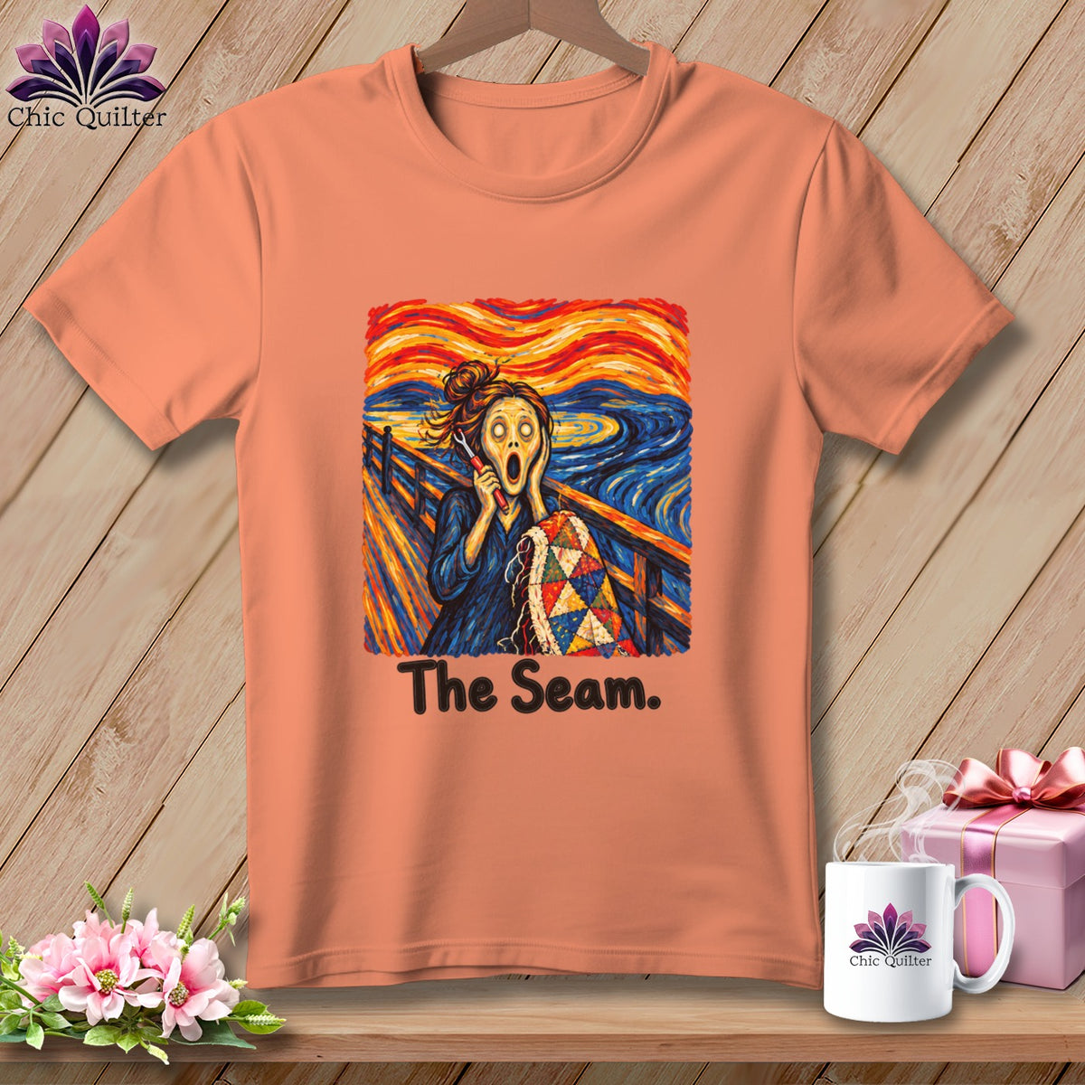 Orange t-shirt with "The Seam" text and a quilt-themed "The Scream" parody.