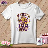 A white t-shirt features a purple and gold graphic with a Viking holding a needle.