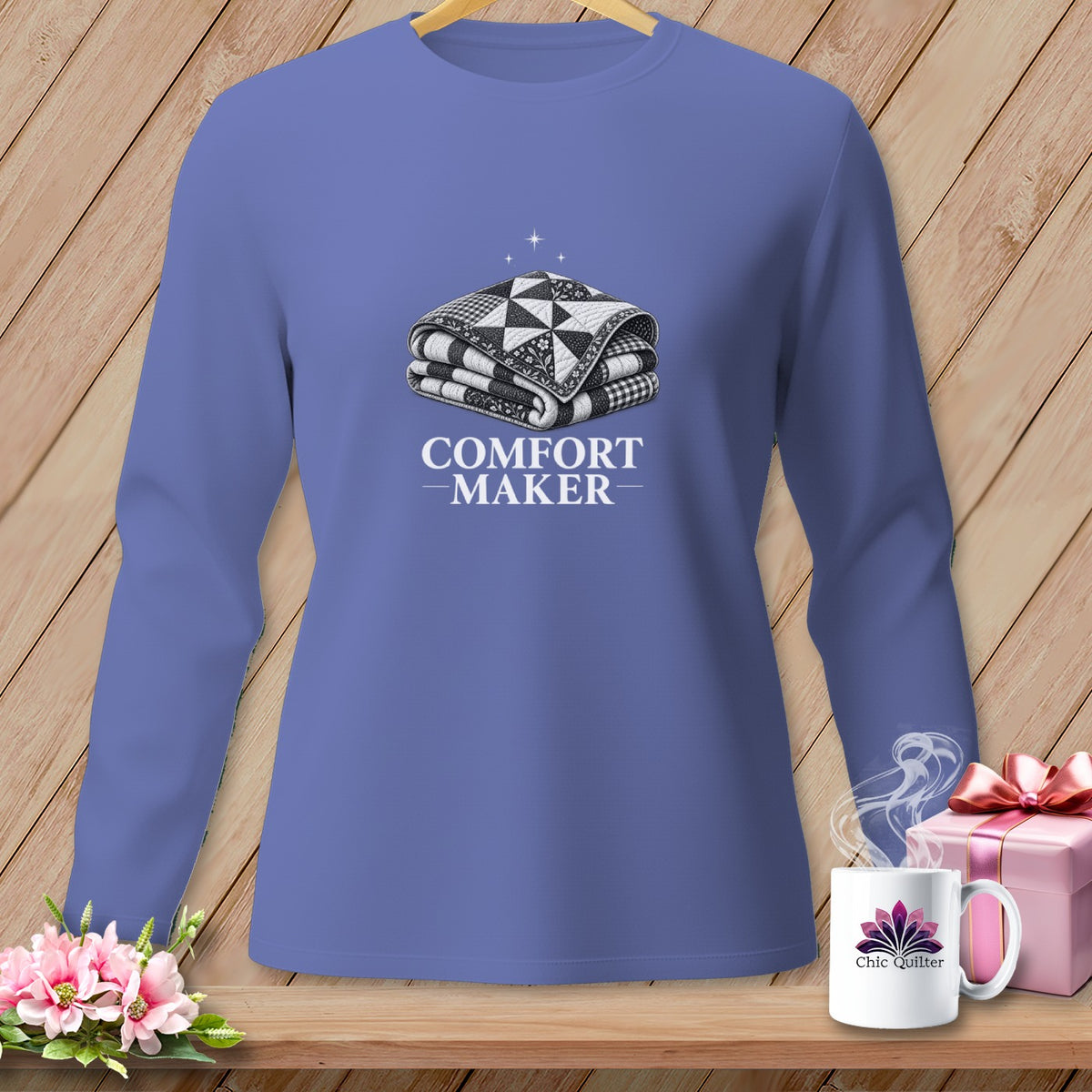 Lavender long-sleeve shirt with a folded quilt graphic and "COMFORT MAKER" text.