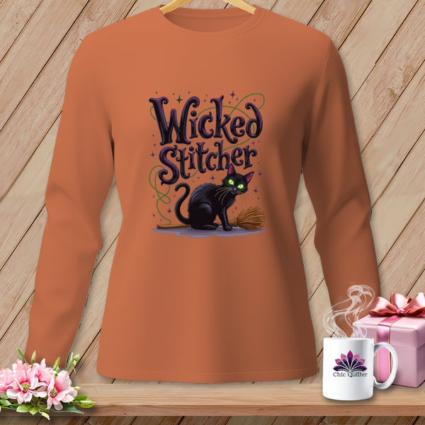 Orange long-sleeve shirt with black cat and "Wicked Stitcher" text.