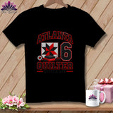 Black t-shirt featuring a red and white quilt block graphic, sewing supplies, and text reading Atlanta Quilter Stitch Six.