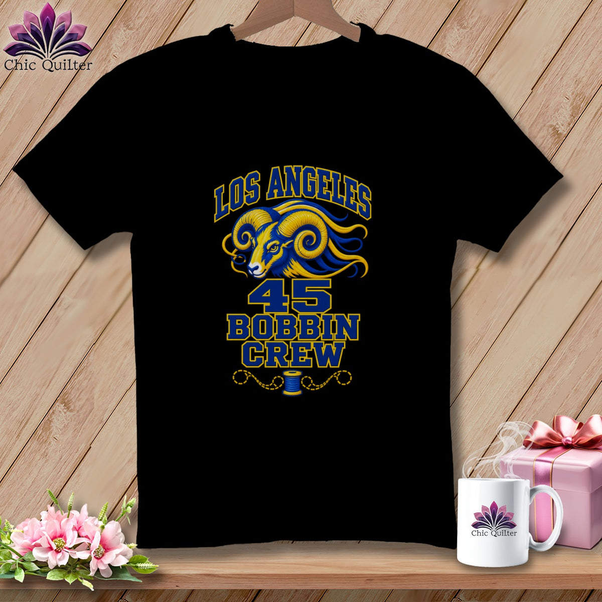 A black t-shirt featuring a blue and yellow ram graphic with text reading Los Angeles 45 Bobbin Crew.