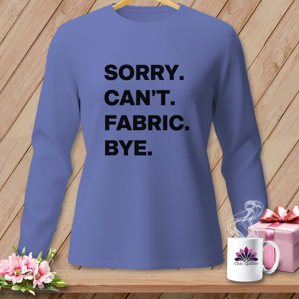 Long sleeve shirt with "Sorry. Can't. Fabric. Bye." text and Chic Quilter logo on mug.