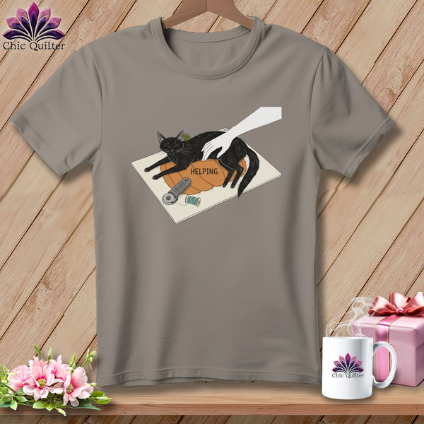 Illustration of a black cat relaxing on a pumpkin with a hand petting it.