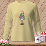 Long sleeve beige shirt with a cartoon flamingo wearing a scarf and holding a present.