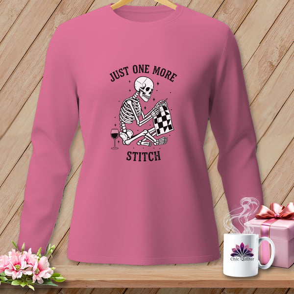 Skeleton sewing with text "Just one more stitch" on pink long sleeve shirt.