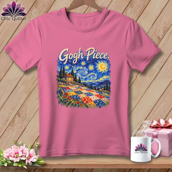A pink t-shirt featuring a Starry Night graphic with a quilt pathway and text reading Gogh Piece.