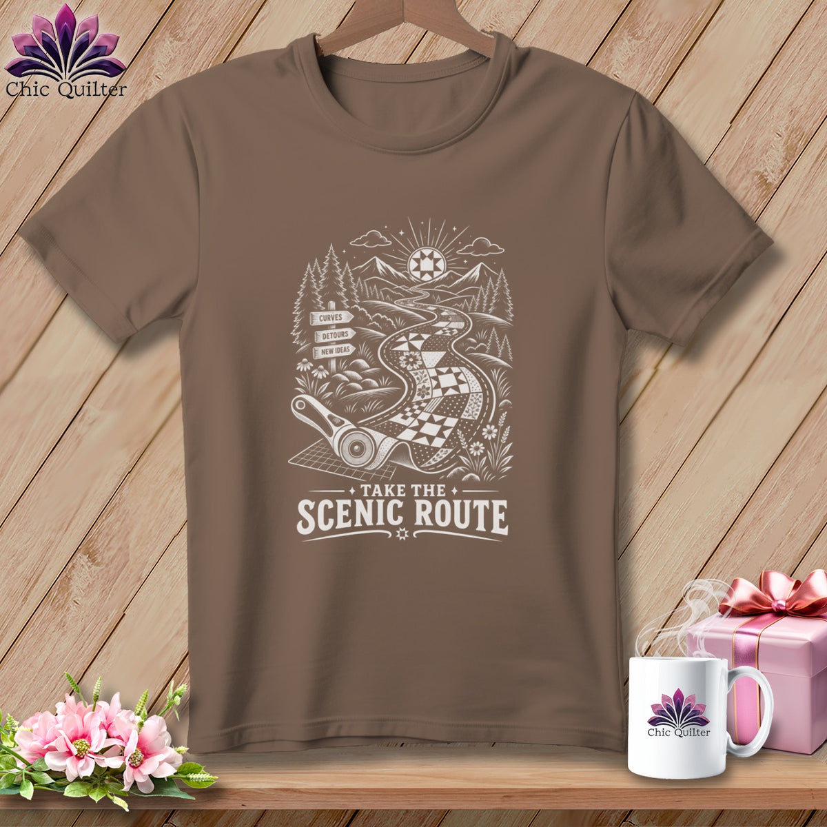 Brown t-shirt with "Take the Scenic Route" text and quilt road design.
