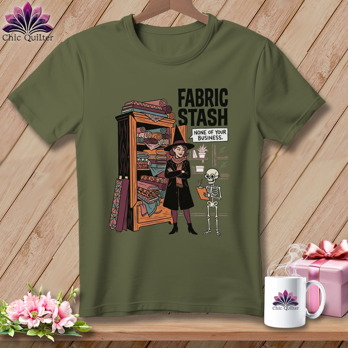 Witch and skeleton with "Fabric Stash None of Your Business" text on t-shirt.