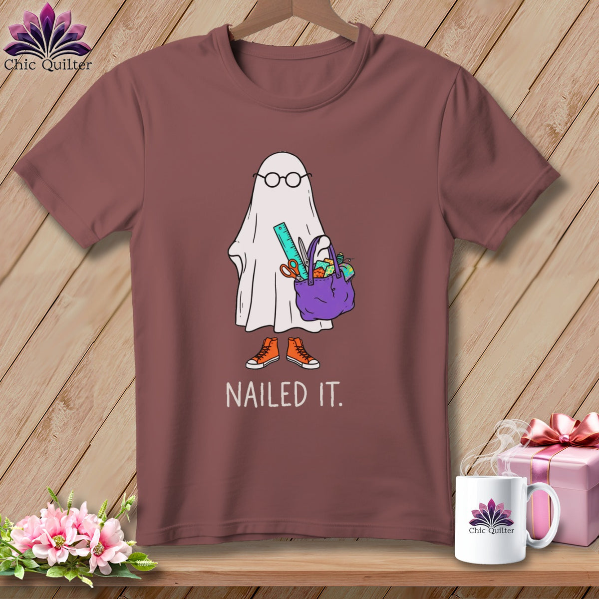 Ghost wearing glasses and holding a craft bag, with "NAILED IT." text.