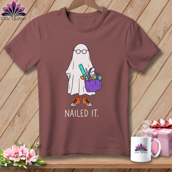 Ghost wearing glasses and holding a craft bag, with "NAILED IT." text.