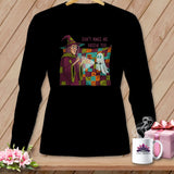 Black long sleeve shirt with witch and ghost graphic that reads 