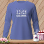 Purple long-sleeve shirt with "CLOSE ENOUGH." text and quilt block graphics.