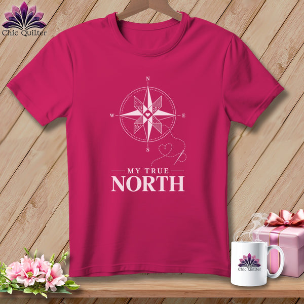 Pink t-shirt with compass graphic and "MY TRUE NORTH" text.