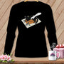 Black long sleeve shirt with a graphic of a cat, a hand, and sewing supplies.