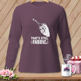 Purple long-sleeve shirt with white text and graphic of scissors cutting fabric.