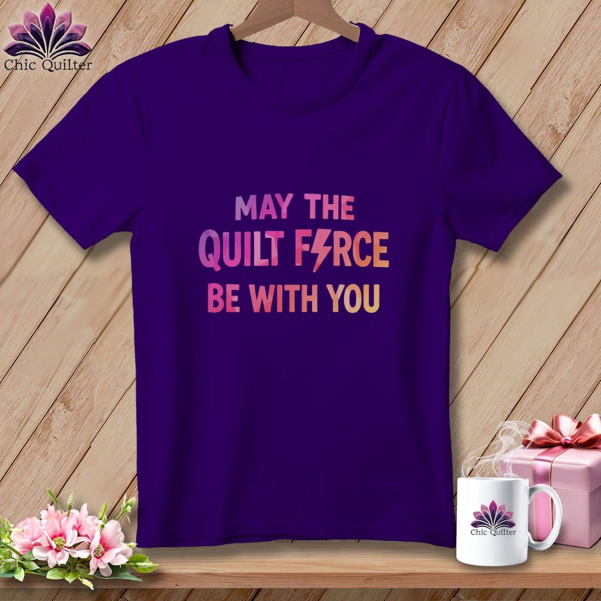 Purple t-shirt with text "May the Quilt Force be with you".