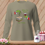 Green Grinch hands hold fabric and wine with text 
