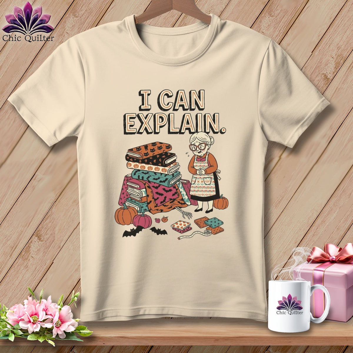 T-shirt with "I CAN EXPLAIN" text and sewing-themed Halloween graphic.
