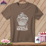 Brown t-shirt with white illustration of a basket overflowing with fabric scraps and the text 