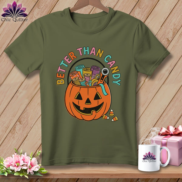 Olive green t-shirt with pumpkin filled with sewing notions and "Better Than Candy" text.