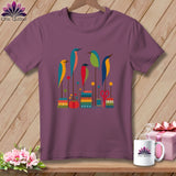 Plum crewneck t-shirt featuring a colorful graphic of five stylized birds perched on sewing-themed elements.