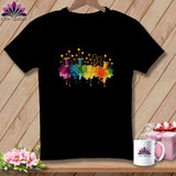 Black t-shirt with colorful sewing supplies and rainbow watercolor splash design.