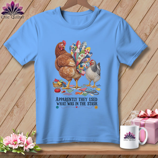 Light blue t-shirt with two chickens and patchwork tail, text reads "APPARENTLY THEY USED WHAT WAS IN THE STASH."