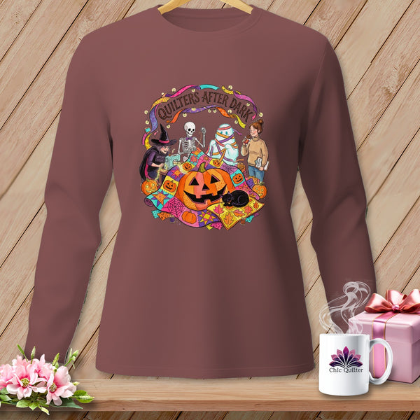 Halloween design with witch, skeleton, mummy, and pumpkin on a long-sleeve shirt.