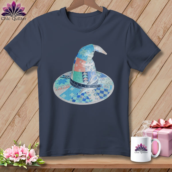 Navy t-shirt with a quilted witch hat graphic and the text "SEW WITCHY".