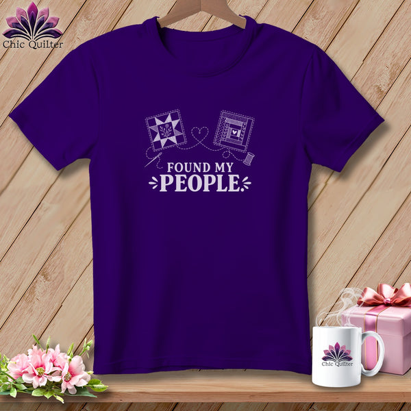 Purple t-shirt with "Found My People" text and quilt designs.