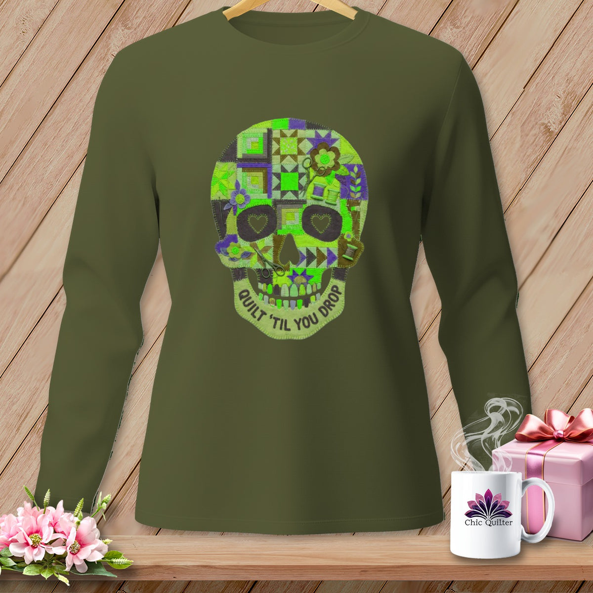 Green long-sleeve shirt with a quilted skull graphic and "Quilt 'Til You Drop" text.