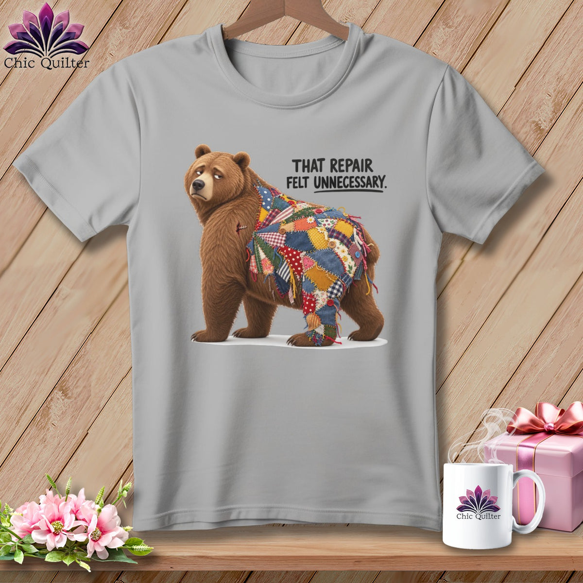Bear with a patchwork quilt covering its back and text "THAT REPAIR FELT UNNECESSARY."
