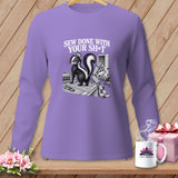 Skunk wearing a bow on a sewing table with text 