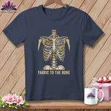 Skeleton with sewing supplies inside its ribcage and the text 