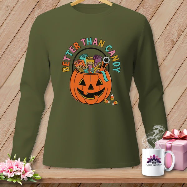 Green long-sleeve shirt with a pumpkin filled with sewing supplies and "Better Than Candy" text.