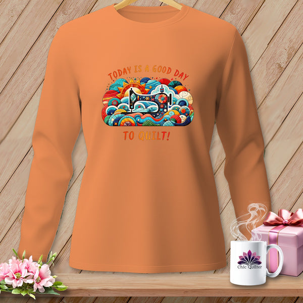 Orange long-sleeve shirt with "Today is a good day to quilt!" graphic.