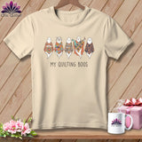 T-shirt with five whimsical ghosts in patchwork patterns and text 