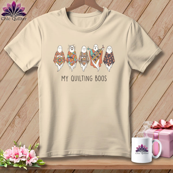 T-shirt with five whimsical ghosts in patchwork patterns and text "My Quilting Boos."