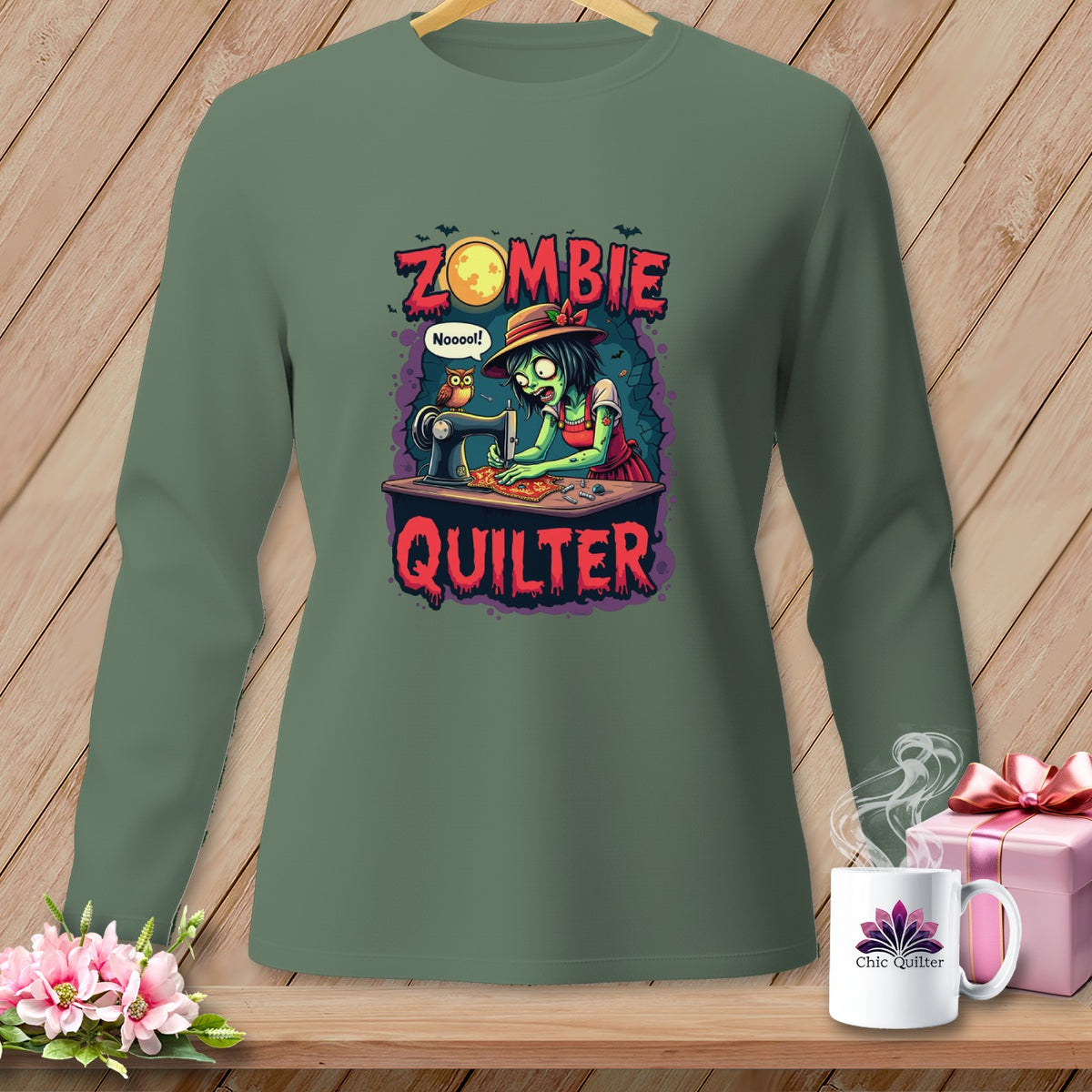 Green long-sleeve shirt with "Zombie Quilter" graphic featuring a zombie sewing.