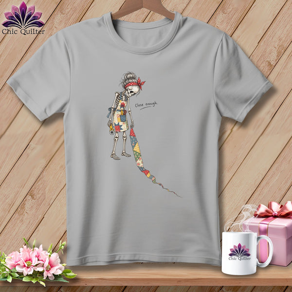 Gray t-shirt with skeleton quilter graphic and "Close enough" text.