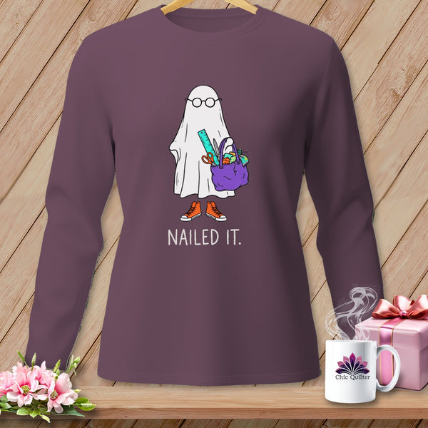 Ghost graphic with glasses, carrying a purple bag, wearing orange shoes, and text "NAILED IT."