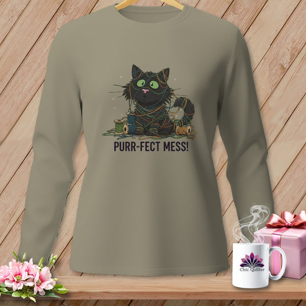 Brown long-sleeved shirt with cartoon black cat tangled in colorful yarn, saying "PURR-FECT MESS!".
