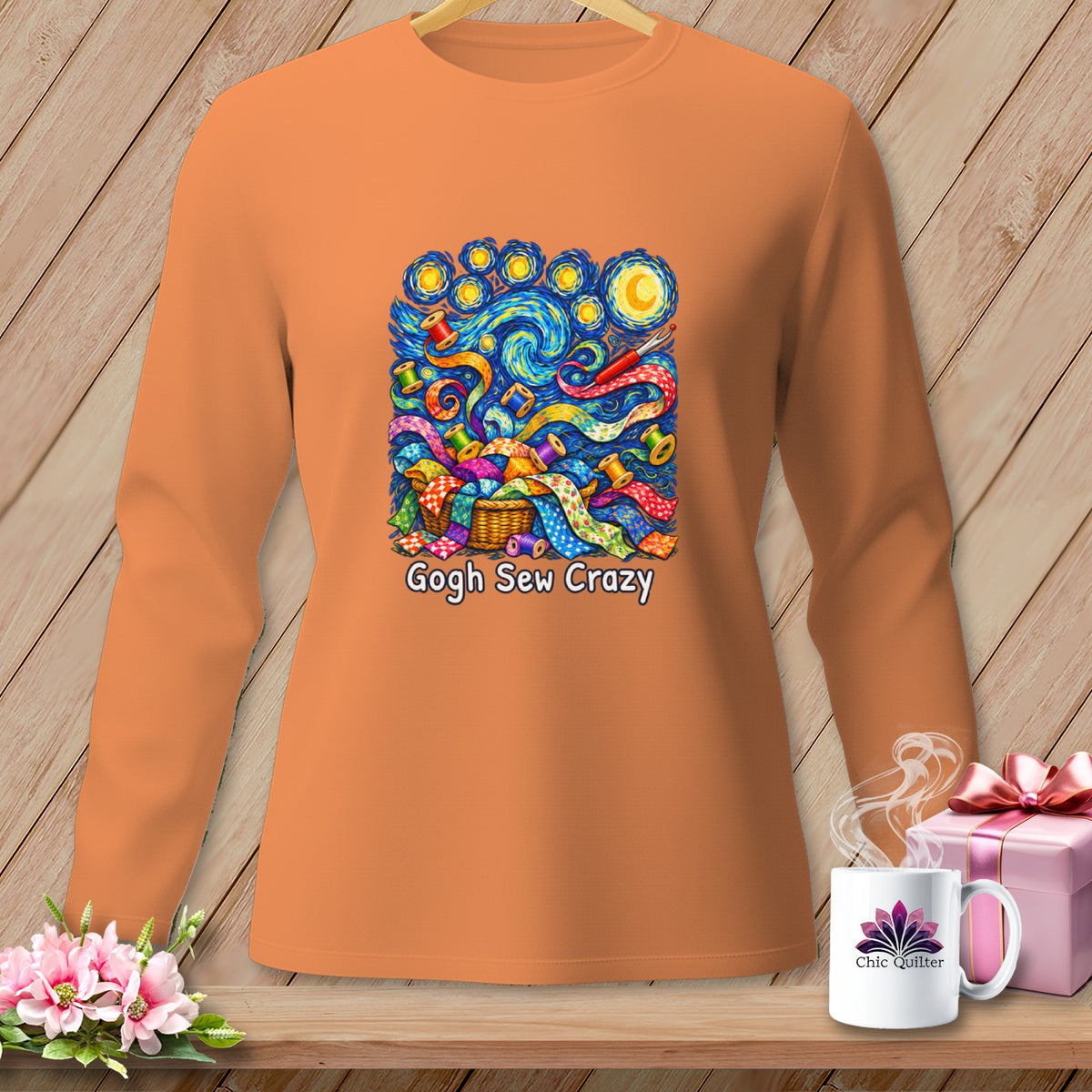 Orange long-sleeve shirt with "Gogh Sew Crazy" graphic featuring sewing supplies.
