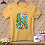 Yellow t-shirt hanging on a wooden background, featuring a colorful swirling quilting graphic on the front.